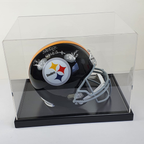 Signed Pittsburgh Steelers helmet in a clear display case on a white background