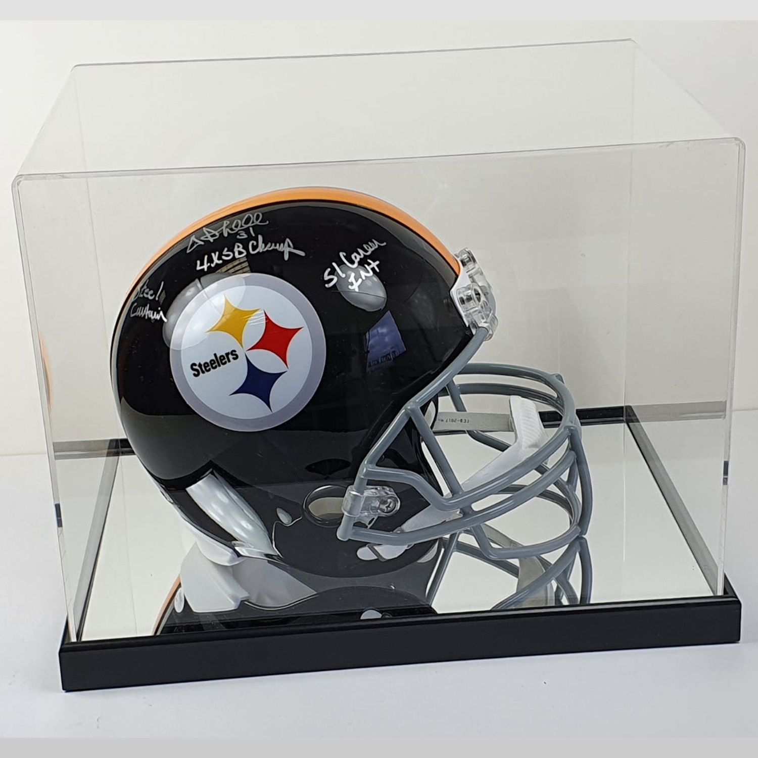 Pittsburgh Steelers football helmet in a clear display case on a white background