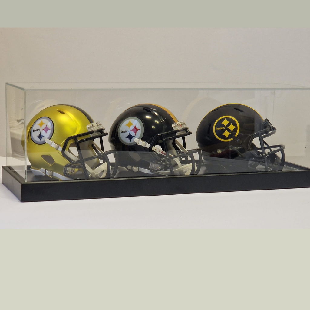 Three Pittsburgh Steelers mini football helmets in a clear display case on a white background