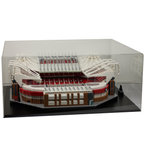 Model of Old Trafford stadium made from Lego building blocks in a clear display case, on white background.