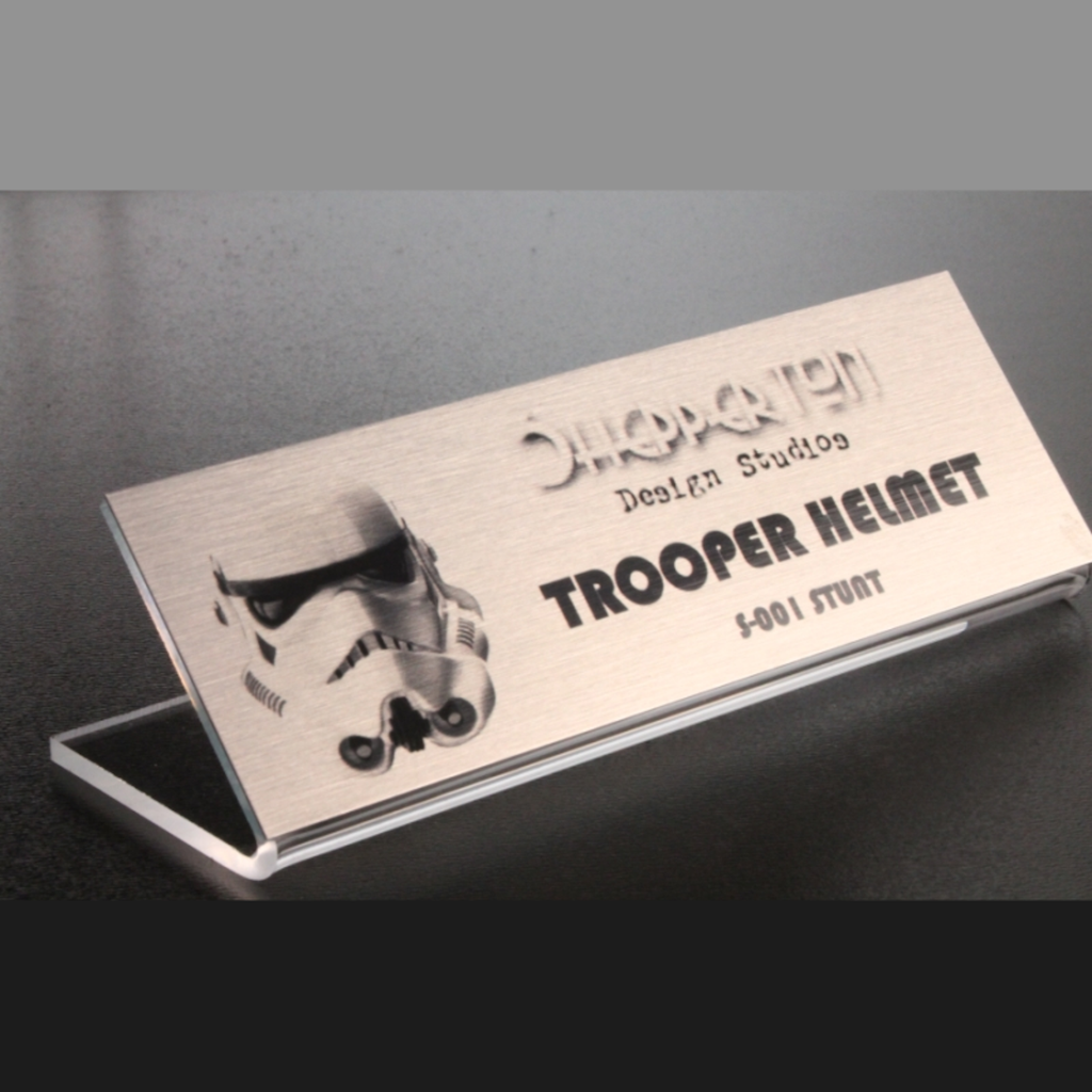 Metal plaque 120 x 40 on acrylic stand
