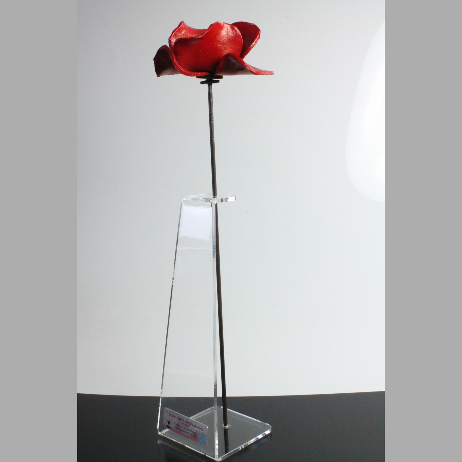 Ceramic poppy on acrylic stand with Tower of London plaque
