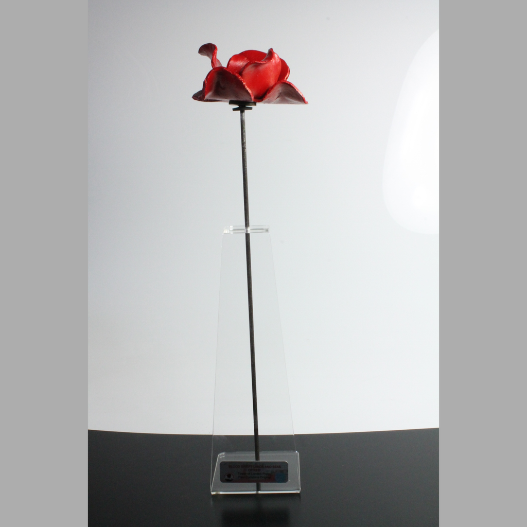 Ceramic poppy on acrylic stand with Tower of London plaque