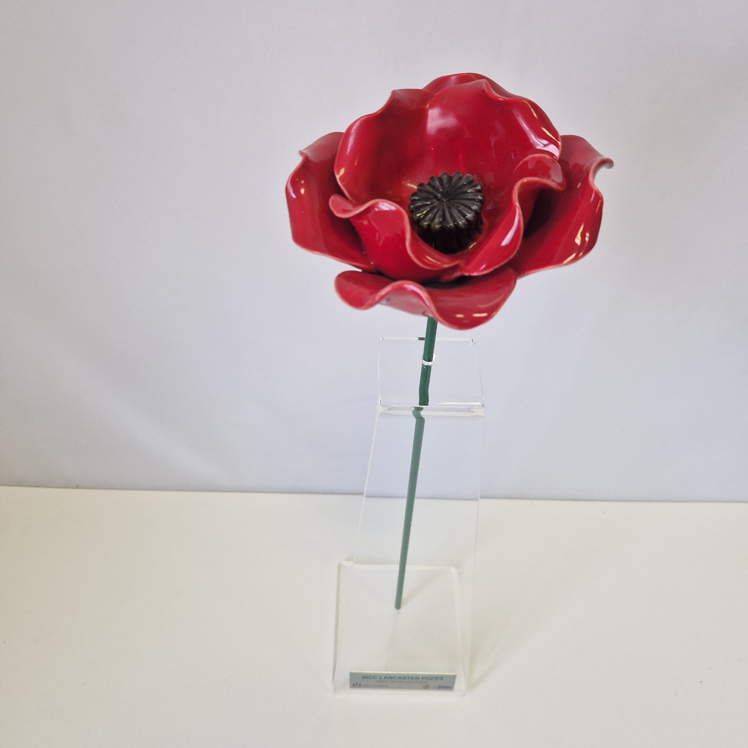 Ceramic poppy on stand